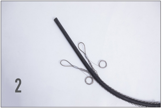 Place the cable or wire into the mesh sleeve as shown in the diagram