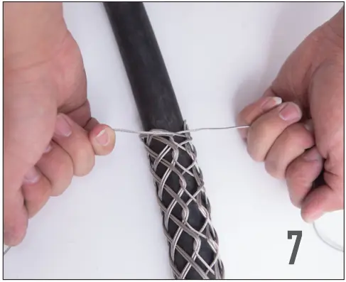 safely wrap the excess traction ropes at both ends together